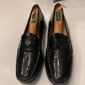 Cole Haan black patent leather Nike Air soles loafers.